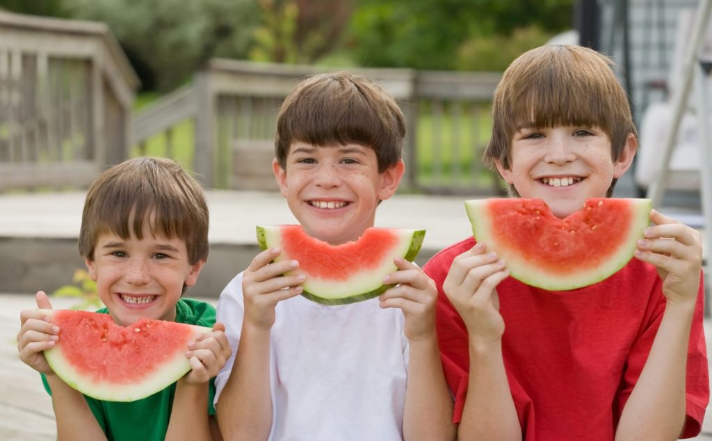 Three Boys Eating Watermelon