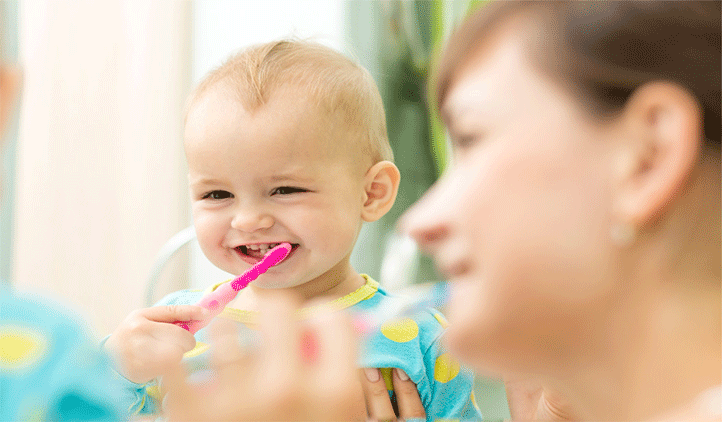 baby-mom-brushing-teeth