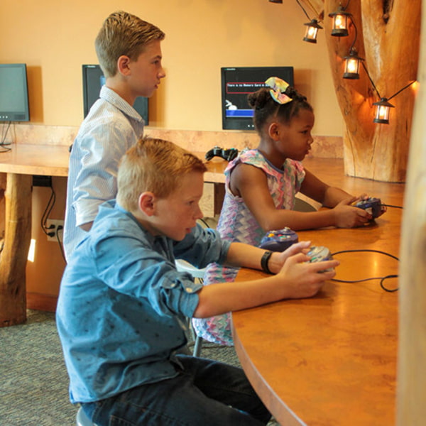 Little patients playing Nintendo GameCubes in The Kidds Place waiting room